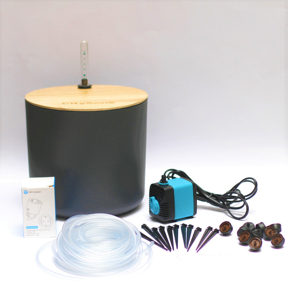 Arrosage goutte à goutte automatique avec réservoir d'eau