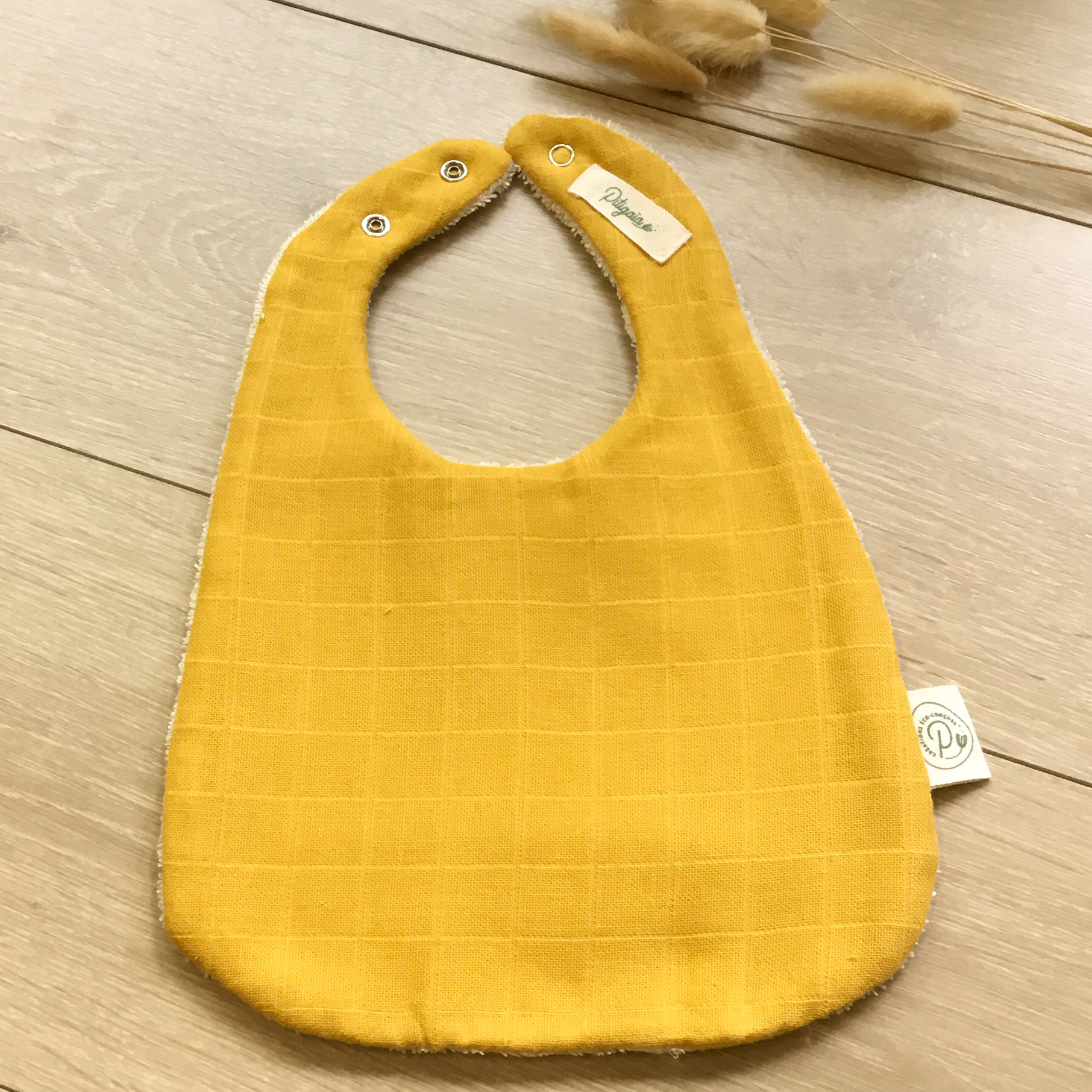 Bavoir en coton bio certifié GOTS Pitigaïa jaune