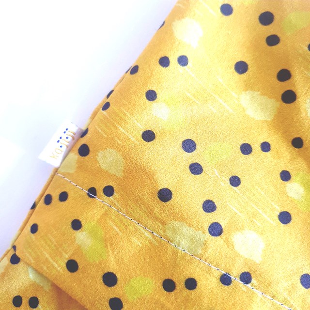 housse de bouillotte sèche aux graines de lin jaune