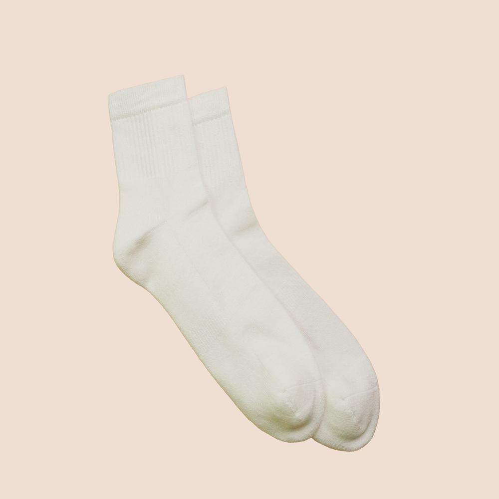 Chaussettes de tennis unies basses en coton biologique pour hommes blanc crème